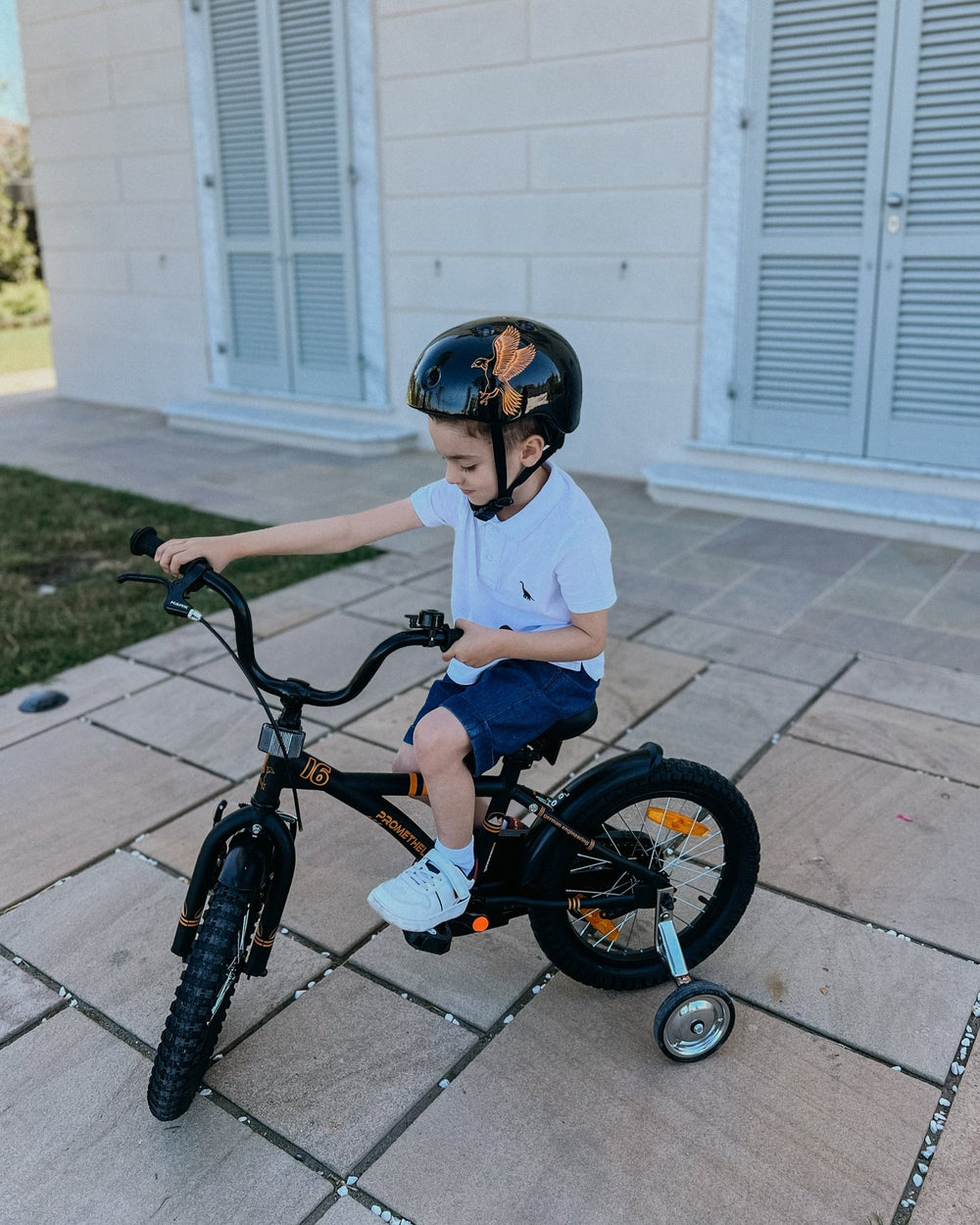 Kinderfahrrad 16 Zoll ab 4 - 5 Jahre mit Stützräder in Schwarz Matt & Orange – Kinderfahrrad 16 Zoll von prometheus - bikes | prometheus - bikes