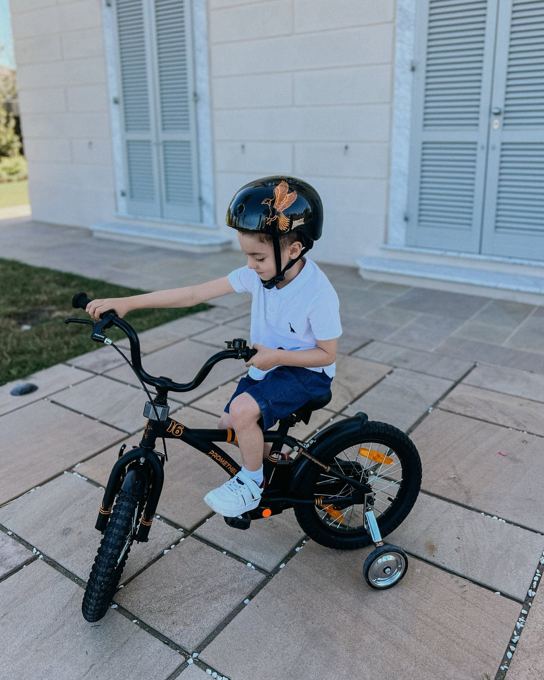 Kinderfahrrad 16 Zoll ab 4 - 5 Jahre mit Stützräder in Schwarz Matt & Orange – Kinderfahrrad 16 Zoll von prometheus - bikes | prometheus - bikes